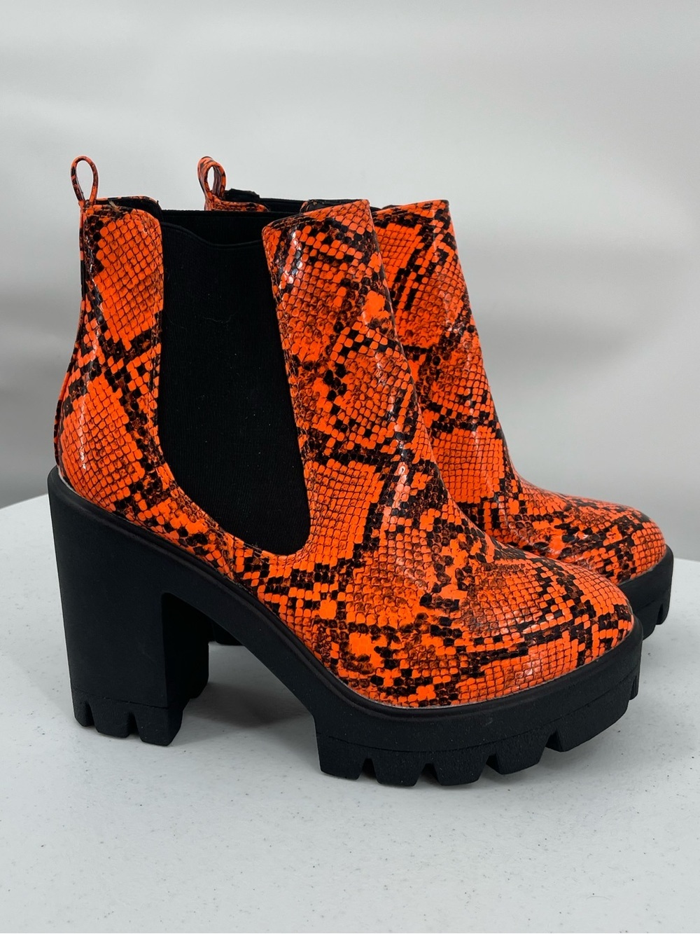 EGO orange reptile snake print chunky lug heel boot